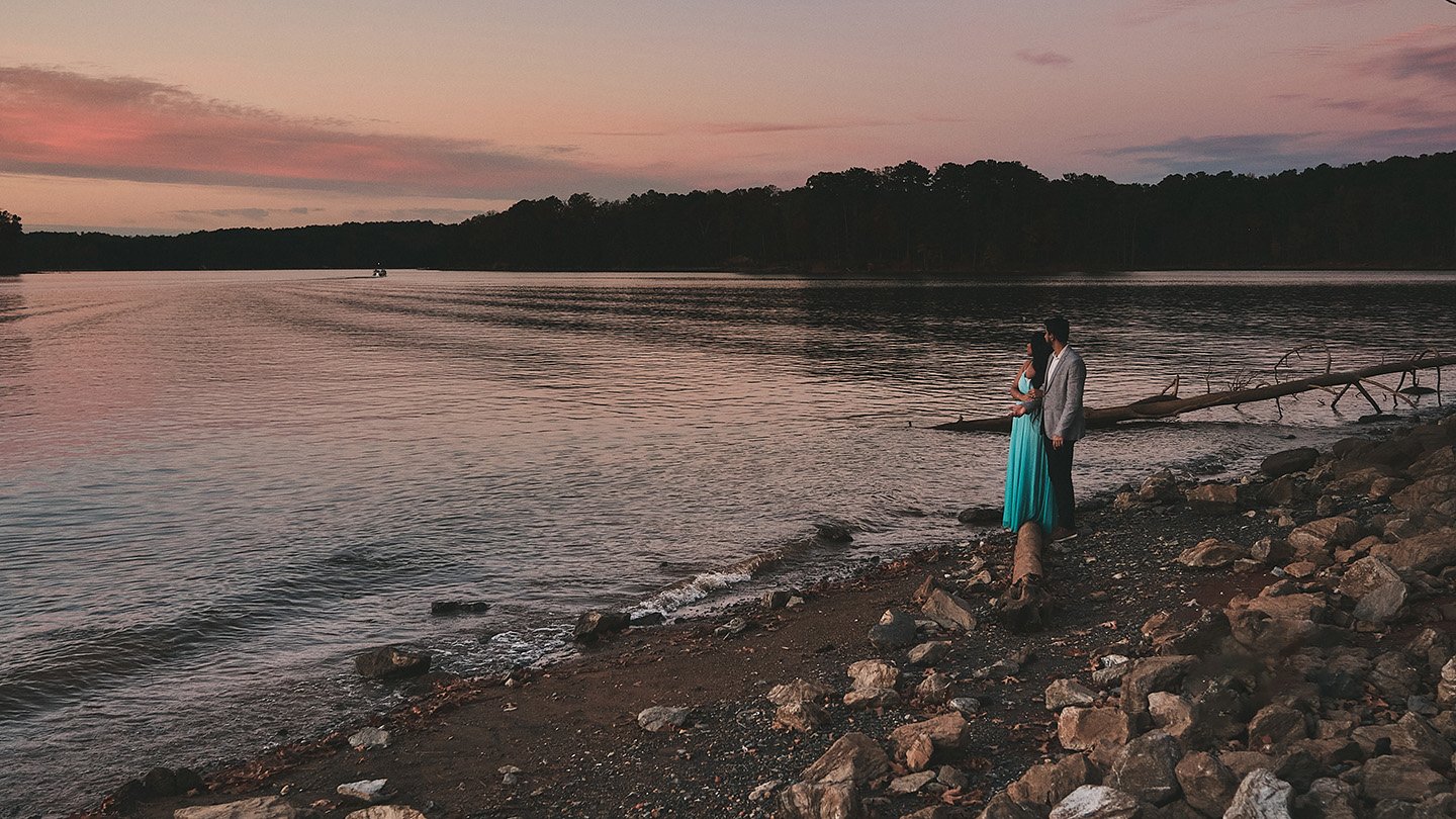 Eloping couple watches the sunset on North Georgia Lake