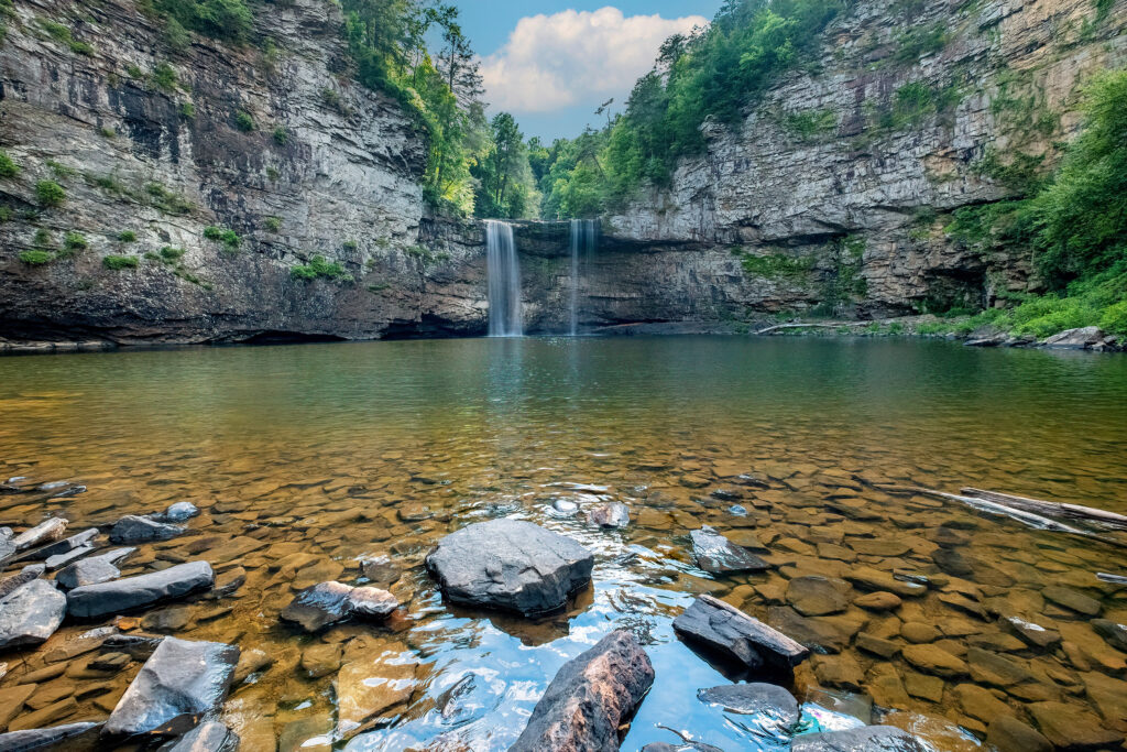 Waterfall surrounded by two cliffs in Tennessee.