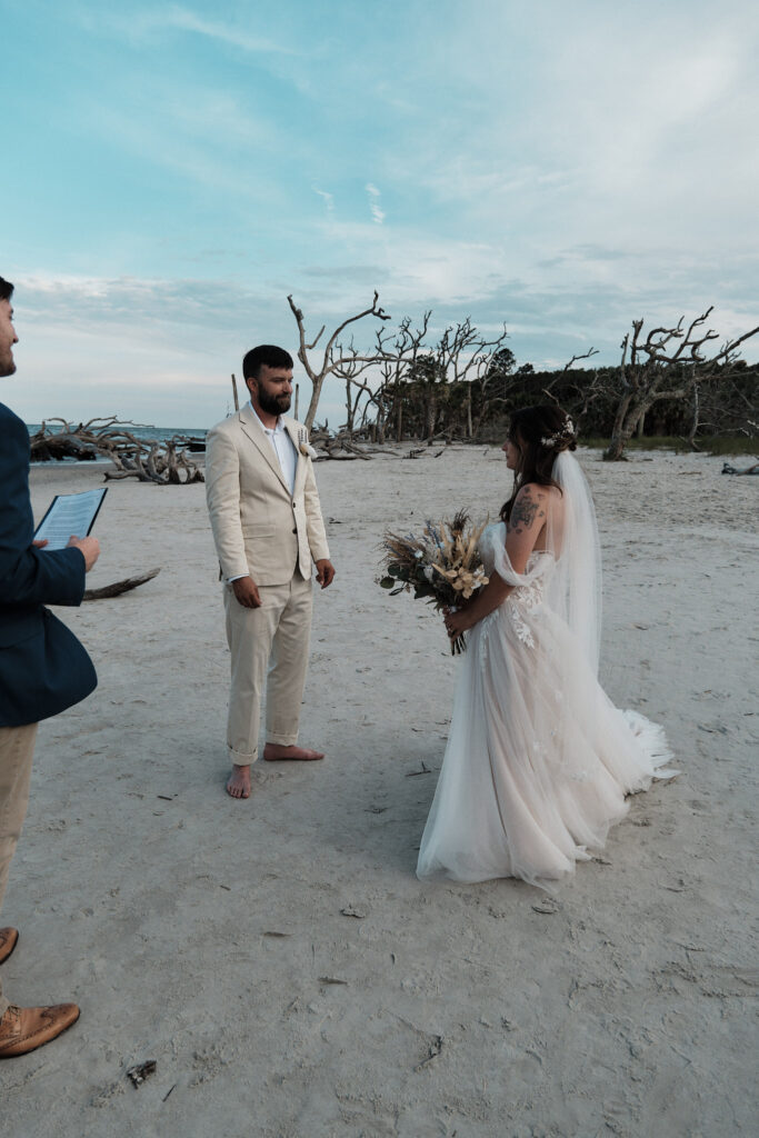 Bride walks to meet her groom before their elopement ceremony