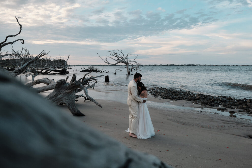 Eloping couple shares a first dance on the beach