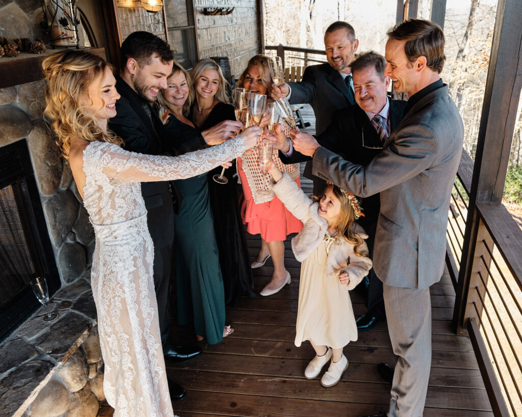 Family celebration toasting champagne after an elopement