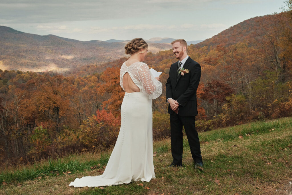 Eloping couple sharing their vows in the mountains of North Carolina