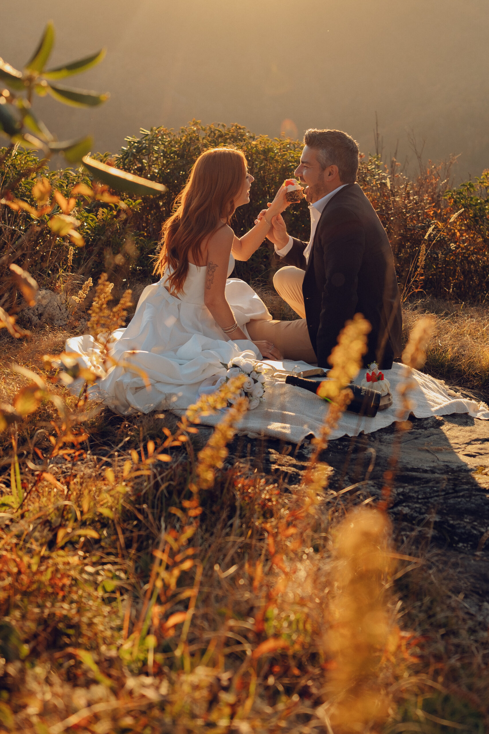 Couple feeds each other desert after their elopement