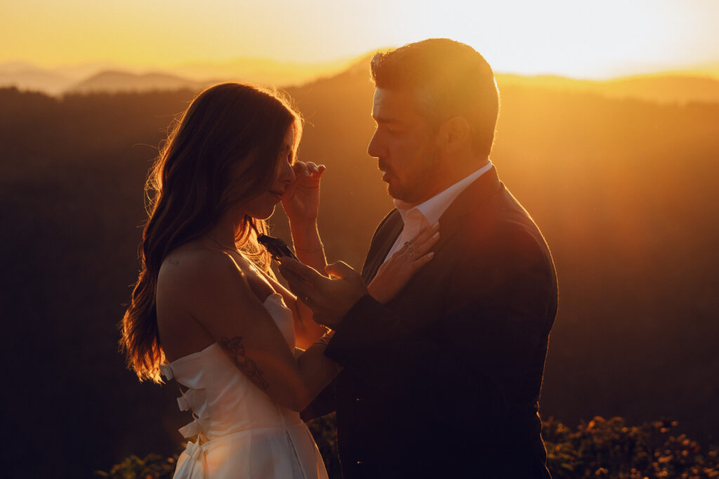 Couple cries while sharing vows during their Acadia National Park Elopement